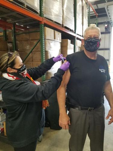 Evans gets vaccinated