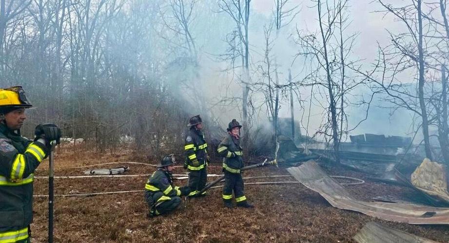 Crews battle barn fire
